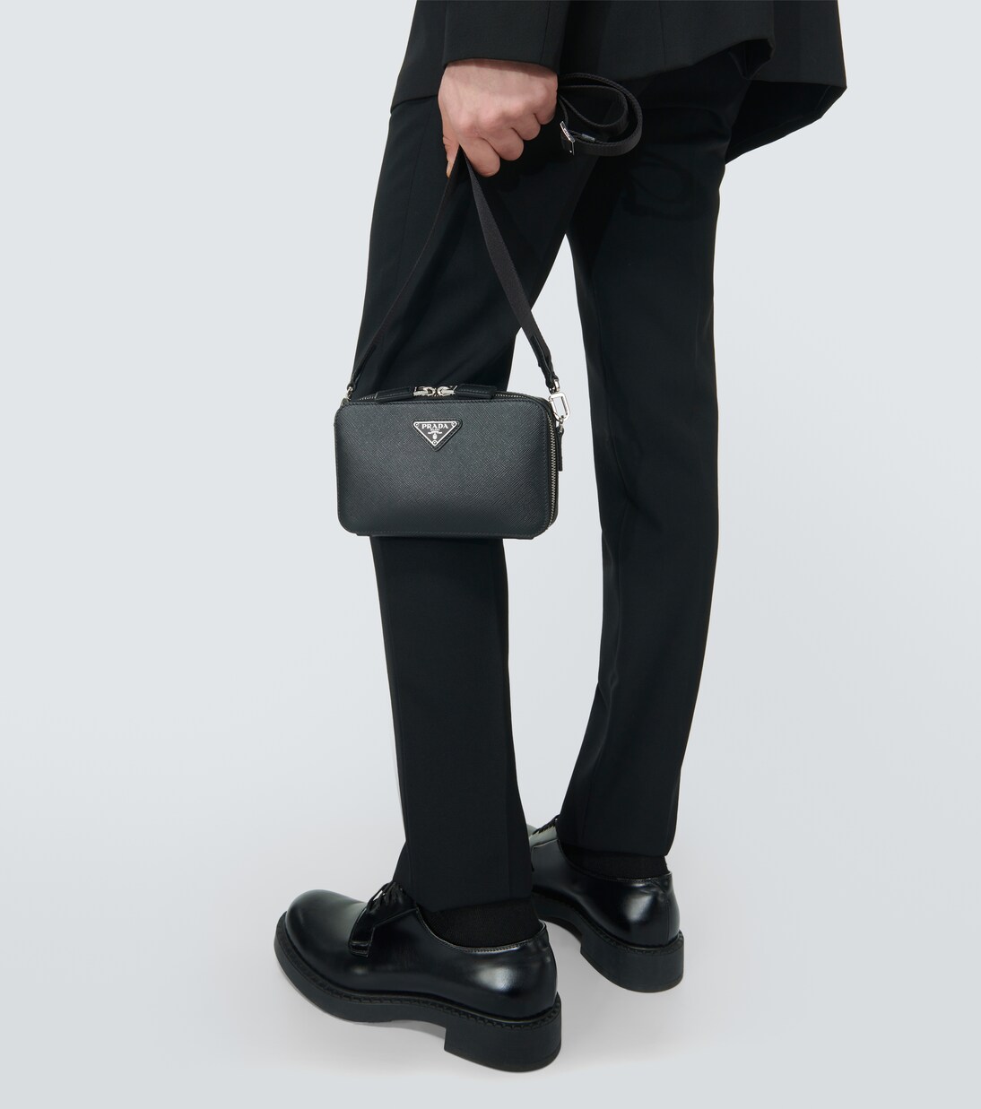 Brique leather crossbody bag in black - Prada | Mytheresa